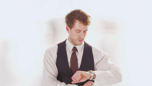 Time lapse of businessman frozen in time as the rest of the world rushes by