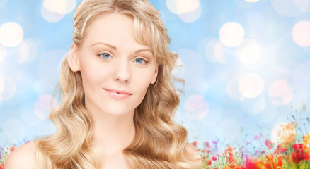 Fototapeta premium beautiful young woman face with long wavy hair