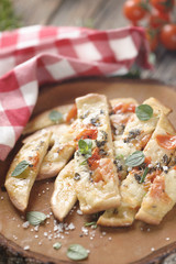 Pizza with cherry tomatoes and cheese