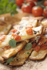 Pizza with cherry tomatoes and cheese