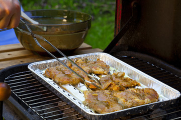 Grilled pork on a tray in the garden
