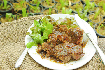 From organic farm to table : Black pepper pork steak served with