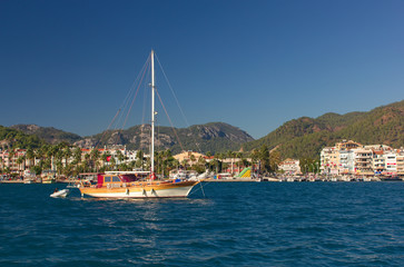 Fototapeta na wymiar White yachts on an anchor in harbor