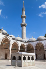 Fototapeta na wymiar Minaret and fountain of Suleymaniye Mosque