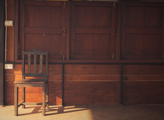 Obraz na płótnie Canvas Vintage old chair in wooden interior
