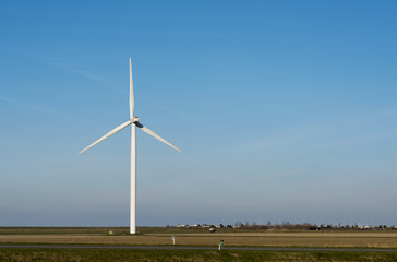Fototapeta premium single windmill in dutch landscape