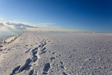 Human footsteps on snow