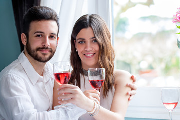 Young couple on date in restaurant.