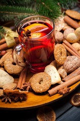Wine. Cookies in the shape of stars, spices and mulled wine on a