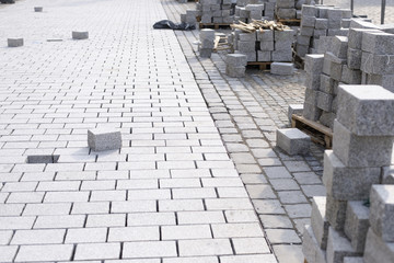 Pavement with cobblestones under construction