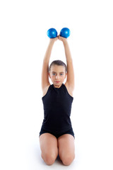 Fototapeta premium Fitness weighted Pilates balls kid girl exercise