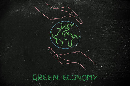hands holding globe, concept of green economy