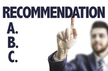 Business man pointing the text: Recommendation