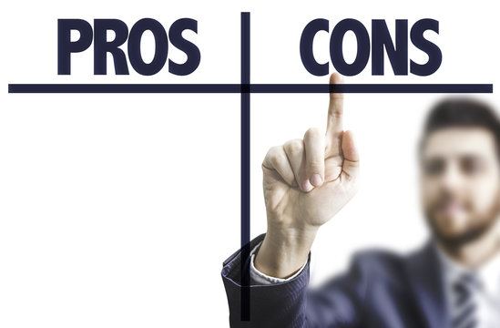 Business man pointing the text: Pros Cons