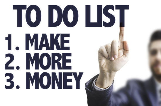 Business man pointing the text: To Do List - Make More Money