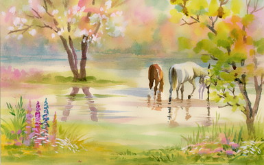 Two horses graze among the trees in the garden