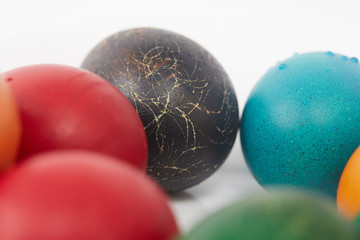 colorful painted Easter eggs on a white background
