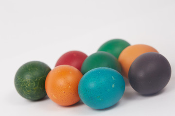 colorful painted Easter eggs on a white background