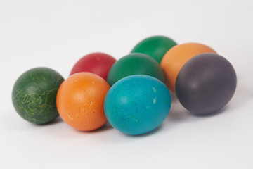 colorful painted Easter eggs on a white background