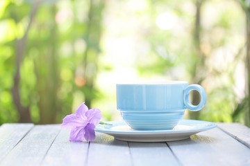 Blue coffee cup and Empty calendar