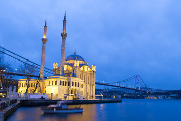 Fototapeta na wymiar Ortakoy mosque and Bosphorus Bridge reflection