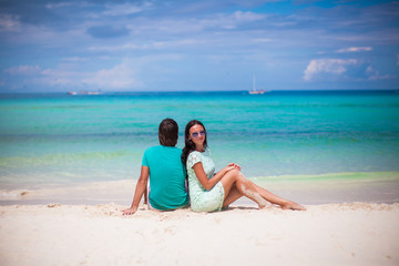 Fototapeta premium Young happy couple have fun on brach vacation