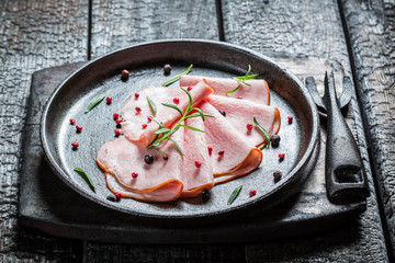 Tasty cold meats with herbs and pepper