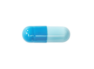 Macro blue medical pill tablet isolated on white