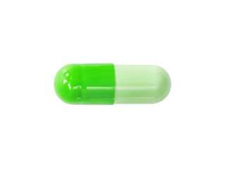 Macro green medical pill tablet isolated on white