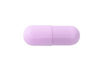Macro pink medical pill tablet isolated on white
