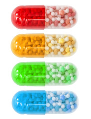 Set of red, blue, green and orange macro medical pill tablet