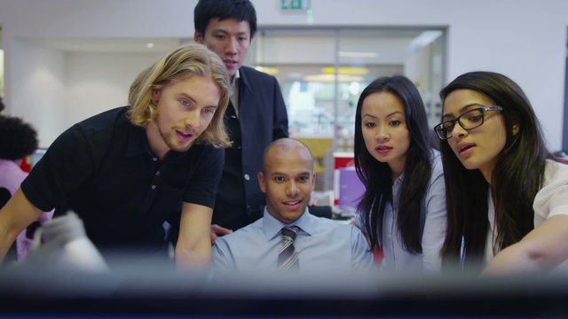 Attractive diverse business group in modern office