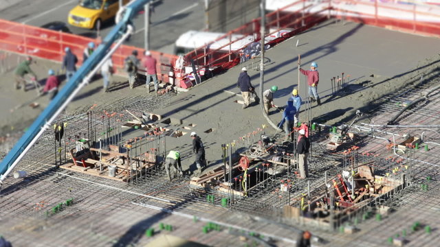Time lapse of a busy city construction crew at work