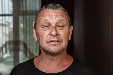 Mature man with lined face