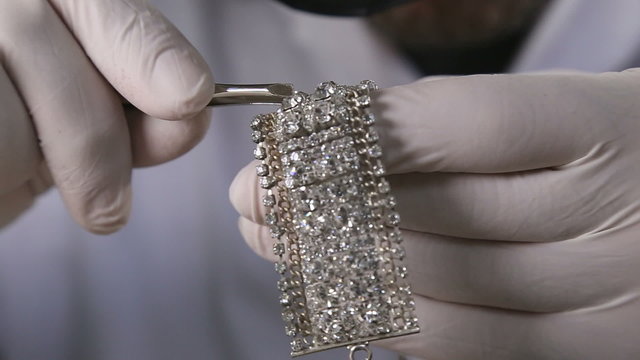 Jeweler In His Studio Working With Diamonds