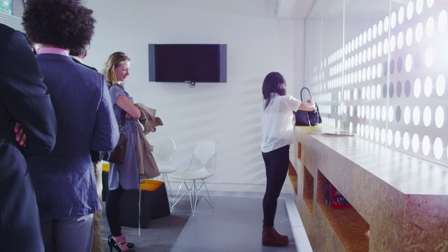 Time lapse of queue of people waiting in line to be served