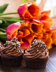 Mothers day  chocolate cupcakes  with spring tulips