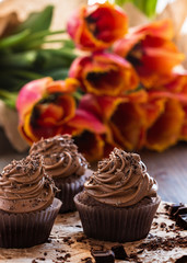 Mothers day  chocolate cupcakes  with spring tulips