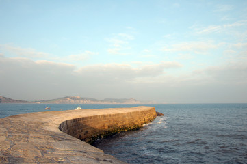 Fototapeta na wymiar Cobb harbour wall in Lyme Regis, Dorset