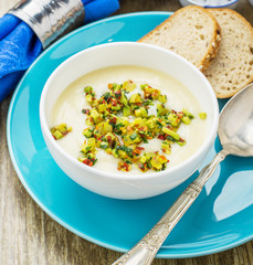 Corn soup with eggs and peppers.
