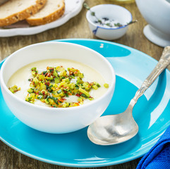 Corn soup with eggs and peppers.