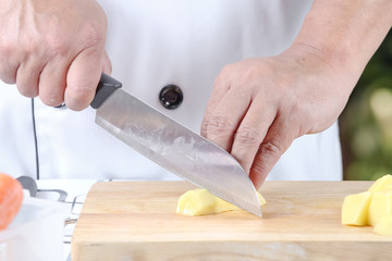Chef sliced potato
