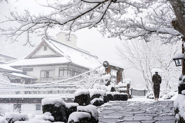 Japan winter scene in rural mountain village during snowfall