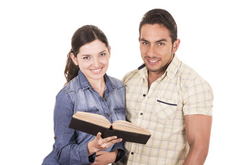 couple of cheerful happy attractive students holding book