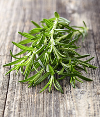 Rosemary on a wooden background