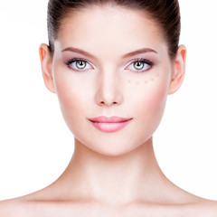 Obraz premium Beautiful young woman with cosmetic foundation on a skin.