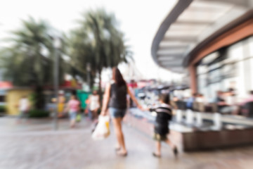 Motion blurred people in the shopping center