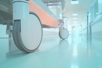 Bed in hospital corridor perspective