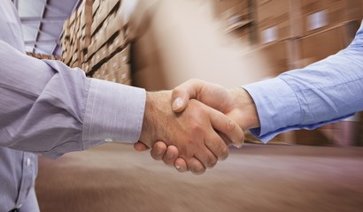 Composite image of men shaking hands - Powered by Adobe