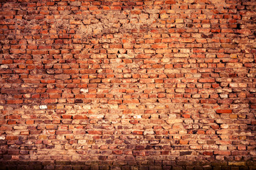 Old grunge brick wall background